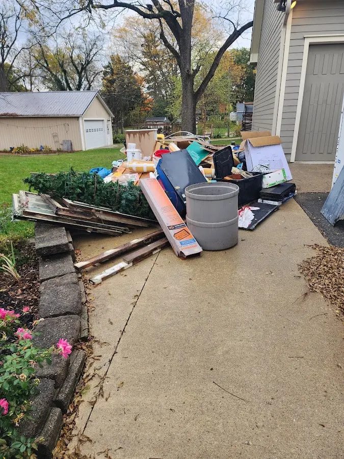Dumpster being loaded with debris for Demolition Dumpster Rental in Orland Park